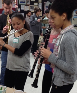 Woodwinds jam with the visual jazz painters as Matt Langley leads on his Soprano Saxophone in the background