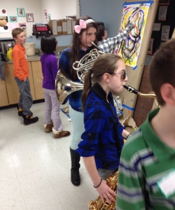 Six grade jazz students wade right into the visual jazz conversation, approaching each painter with call and response